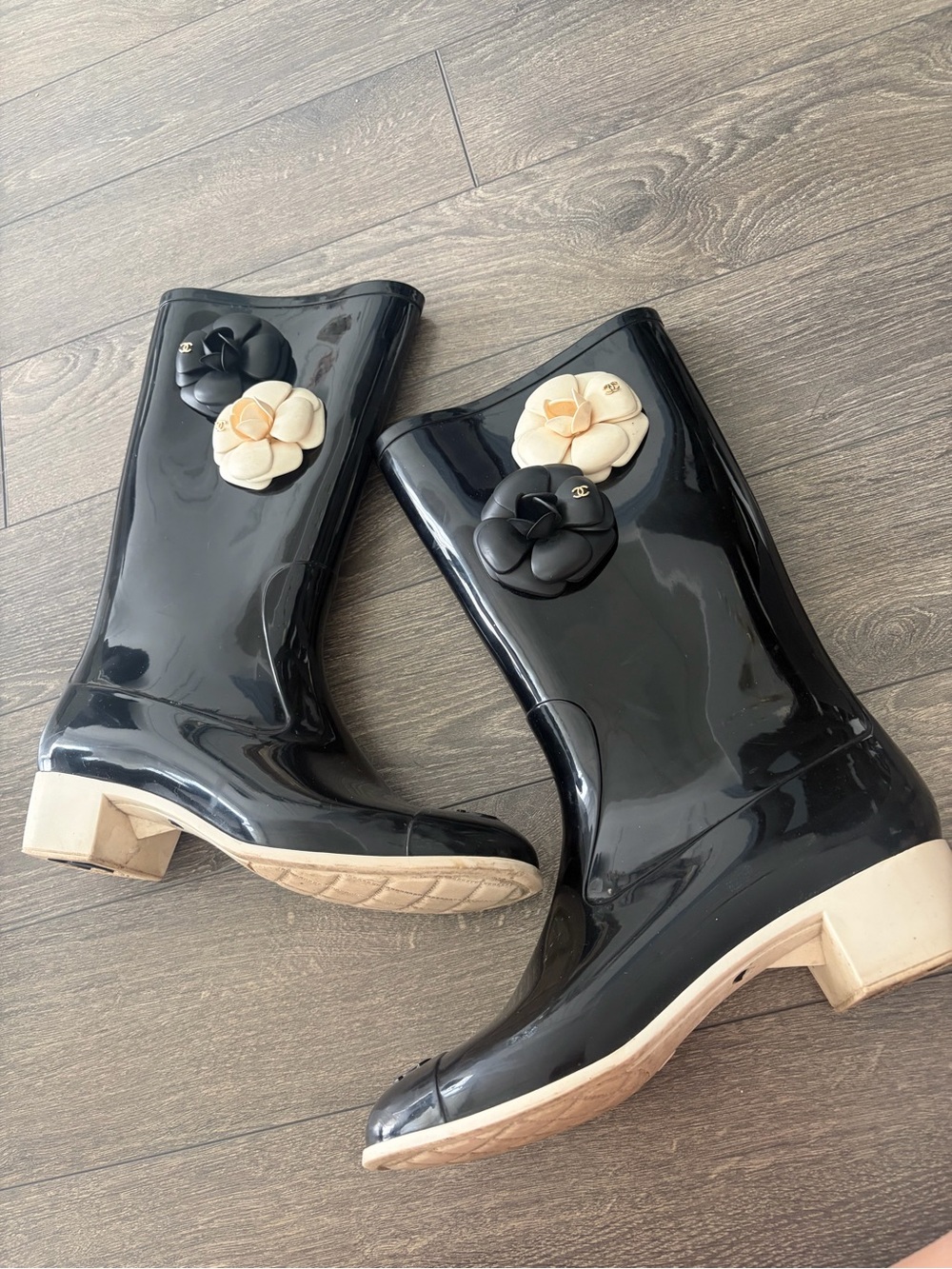 CHANEL Black Patent Rain Boots with Cream Camellia Accents
